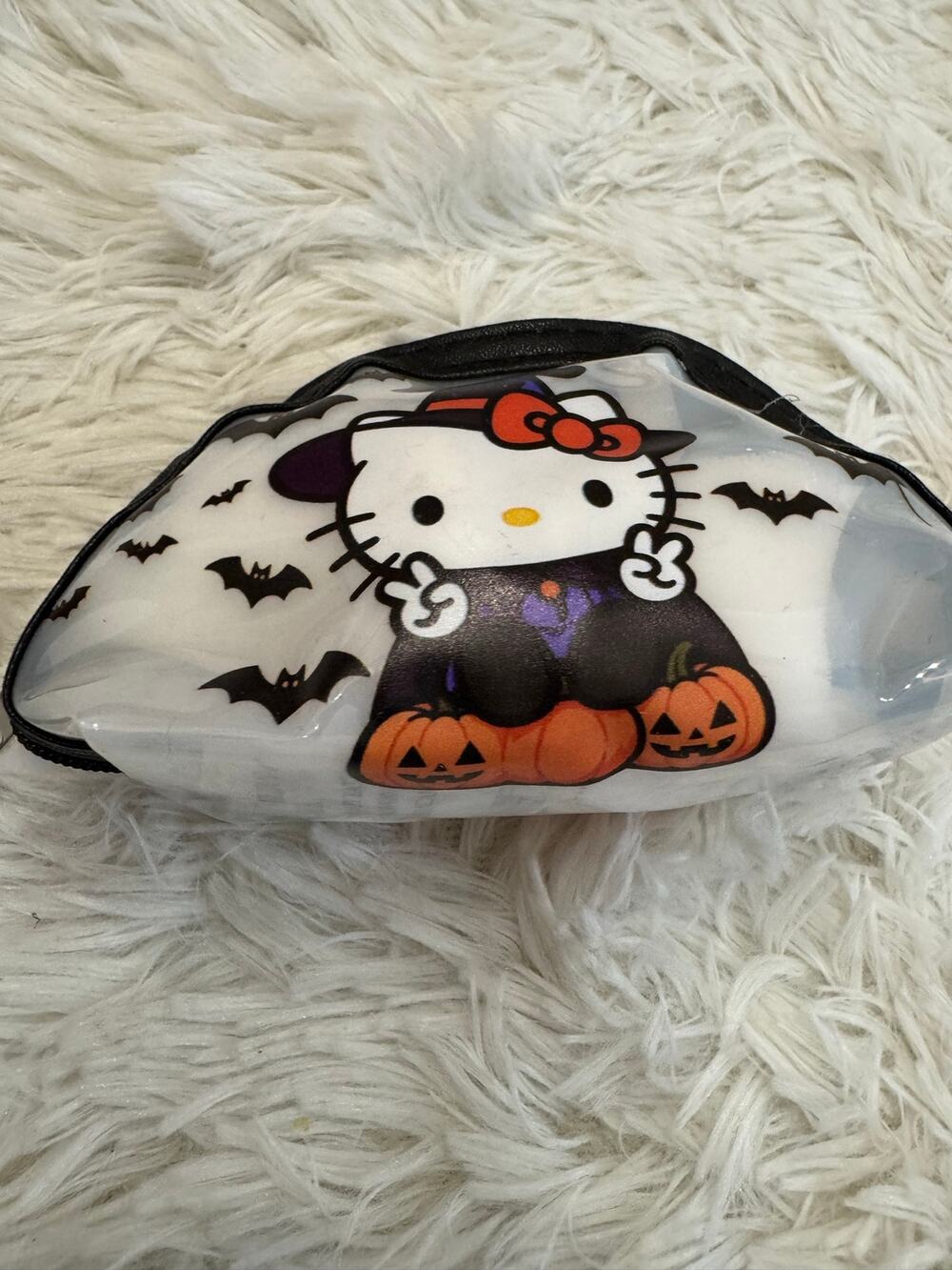 Hello Kitty Halloween coin bag keychain in a witch costume w/ bats and pumpkins
